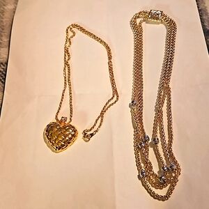 Two like new gold tone necklaces